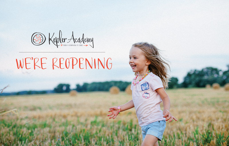 girl running through the grass